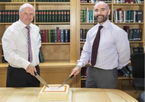 John Duggan & John Kelly cutting Callan Tansey cake